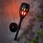 Szezonális akció LED-es szolár lámpa - leszúrható / fali / szabadonálló - lángeffekt - 12 sárga LED - 90 x 410 mm